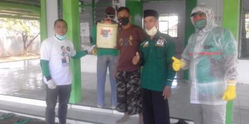 Cegah Penyebaran Covid-19, GP Ansor Bolmong Lakukan Penyemprotan Desinfektan