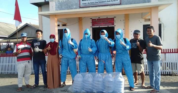 Tim RGT dan Pemuda Tolondadu II Gelar Penyemprotan Cairan Disinfektan