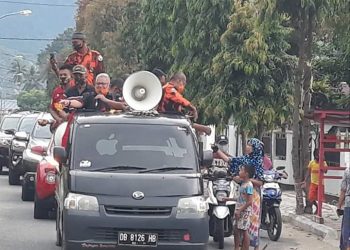 Pemda Bolmut Bersama Pemuda Pancasila Bagikan Masker Gratis