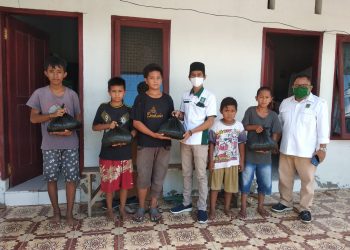 Hardiknas di Tengah Pandemi Covid-19, Garda Bangsa Kotamobagu Bagi Sembako ke Siswa Tak Mampu