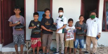 Hardiknas di Tengah Pandemi Covid-19, Garda Bangsa Kotamobagu Bagi Sembako ke Siswa Tak Mampu