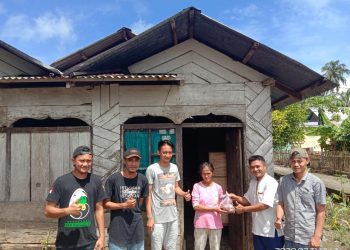 Generasi Muda Molibagu Bagikan Daging Kurban