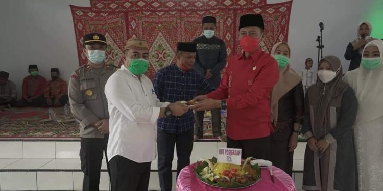 Peringati HUT Ke-18 Kecamatan Posigadan, Iskandar Berpesan Tingkatkan Prestasi