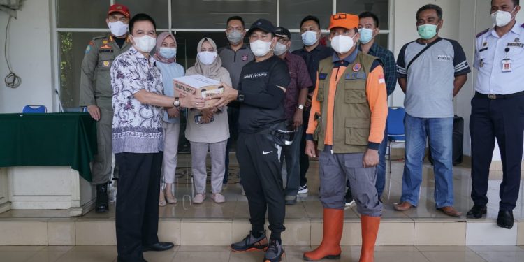 Peduli, Pemkot Kotamobagu Bantu Korban Bencana Alam Manado
