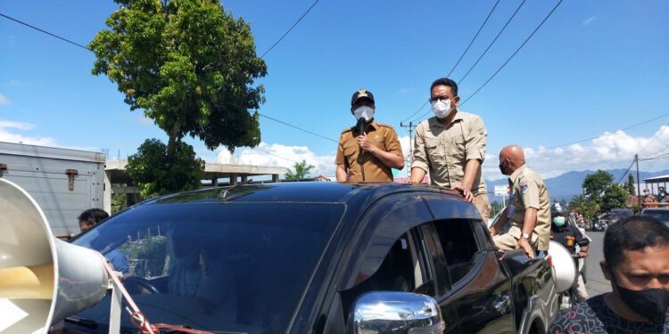 Bupati Boltim Keliling Himbau Masyarakat Taat Prokes