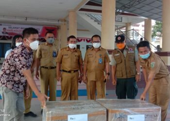 Pemkab Bolmong Terima 10.000 Masker dari PT MES