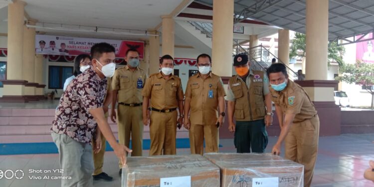 Pemkab Bolmong Terima 10.000 Masker dari PT MES