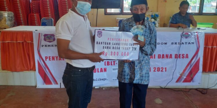 Tahap IX BLT-DD Desa Molibagu Disalurkan