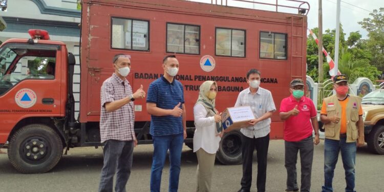 Pemkot Kotamobagu Salurkan Bantuan Bencana ke Mitra