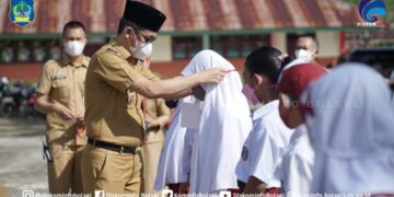 Bupati dan Wabup Bolsel Buka ANBK di Dua Tempat Berbeda