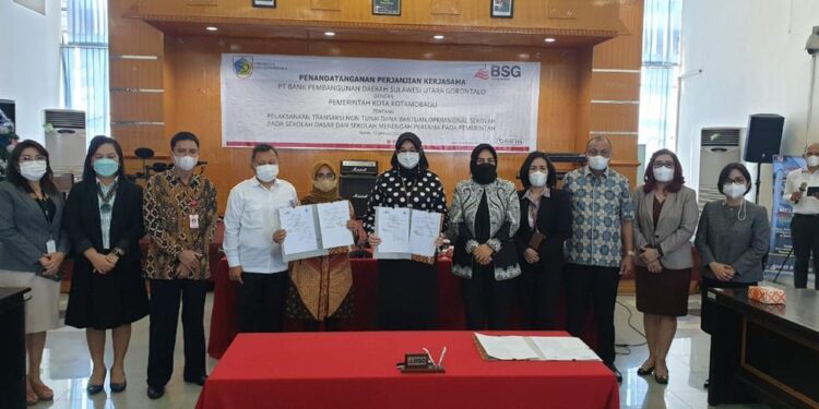 Dukung GNNT, Tatong Bara Teken PKS Penyaluran BOS dengan BSG