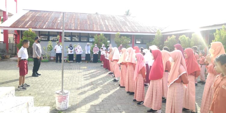 Sukseskan Vaksinasi Usia 6-12 Tahun, Polres Bolsel Gelar Sosialisasi di SDN 1 Molibagu