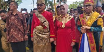 Bupati Limi Mokodompit Dijemput Secara Adat