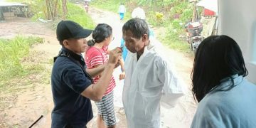 Tim Dokkes Polda Sulut Lakukan Evakuasi dan Perawatan Medis Korban Banjir dan Tanah Longsor di Manado
