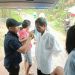 Tim Dokkes Polda Sulut Lakukan Evakuasi dan Perawatan Medis Korban Banjir dan Tanah Longsor di Manado