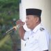 Bupati Bolmut, Drs. H. Depri Pontoh, saat memimpin Apel Perdana pasca Natal dan Tahun Baru