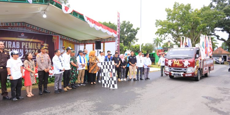 Hadiri Serah Terima Kirab Pemilu 2024, Tatong Bara Dukung Penuh dan Siap Sukseskan