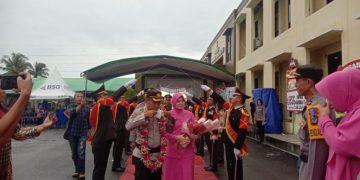 Didampingi Tahlis Gallang, Bupati Limi Mokodompit Hadiri Kenal Pamit Kapolres Bolmong