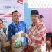 Wali Kota Asripan Nani Serahkan Ribuan Kilo Beras di Kecamatan Kotamobagu Barat