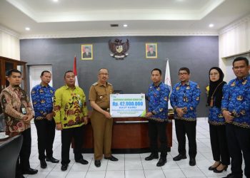 Wali Kota Asripan Nani Serahkan Santunan BPJS Ketenagakerjaan