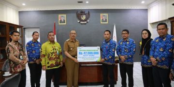 Wali Kota Asripan Nani Serahkan Santunan BPJS Ketenagakerjaan