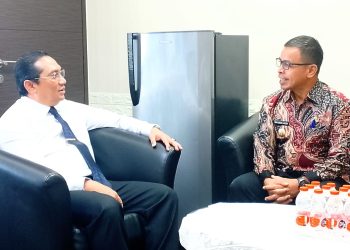 Bupati Bolmut Sirajudin Lasena saat bertemu Yudia Ramli, Direktur BUMD dan BLUD