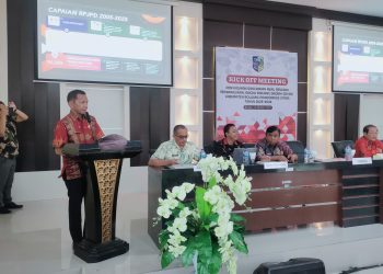 Foto : Sekretaris Daerah, Dr. Jusnan C. Mokoginta, MARS, saat menyampaikan sambutan Pj Bupati pada Kick Off Meeting RPJPD 2025 - 2045