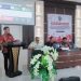 Foto : Sekretaris Daerah, Dr. Jusnan C. Mokoginta, MARS, saat menyampaikan sambutan Pj Bupati pada Kick Off Meeting RPJPD 2025 - 2045