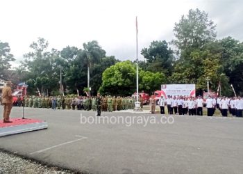 Dikukuhkan Pj Wali Kota Kotamobagu, 725 Anggota Satlinmas Siap Bertugas di TPS
