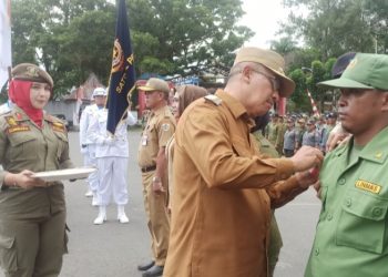 Jelang Pemilu, Asripan Nani Kukuhkan 725 Anggota Satlinmas se Kota Kotamobagu