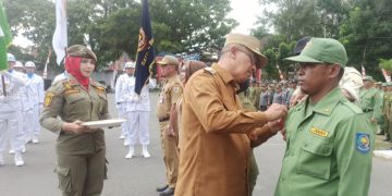 Jelang Pemilu, Asripan Nani Kukuhkan 725 Anggota Satlinmas se Kota Kotamobagu