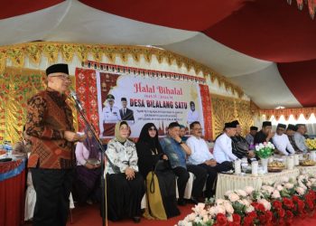 Pj Wali Kota Kotamobagu Hadiri Halal Bihalal Pemerintah dan Masyarakat Desa Bilalang Satu