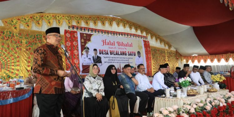Pj Wali Kota Kotamobagu Hadiri Halal Bihalal Pemerintah dan Masyarakat Desa Bilalang Satu