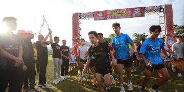 Peluncuran Tahapan Pilkada 2024, Asripan Nani Lepas Peserta Fun Run KPU Kotamobagu