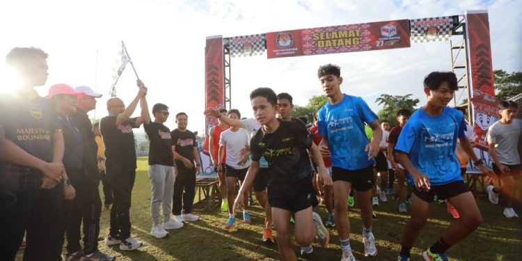 Peluncuran Tahapan Pilkada 2024, Asripan Nani Lepas Peserta Fun Run KPU Kotamobagu