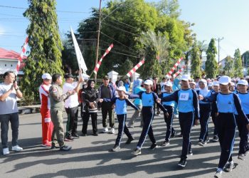 Dilepas Asripan Nani, Lomba Gerak Jalan Tingkat SD dan SMP se Kotamobagu Diikuti 86 Regu