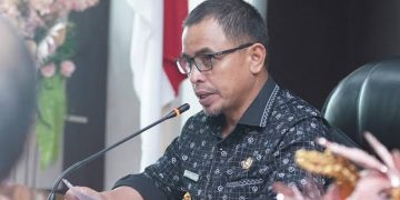 Foto : Pj Bupati Bolmut, Sirajudin Lasena