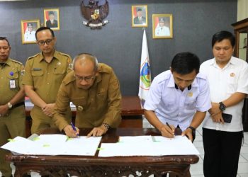 Asripan Nani Teken Naskah Perjanjian Hibah Tanah untuk KPU Kotamobagu
