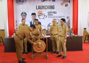 Pj Wali Kota Kotamobagu Abdullah Mokoginta Launching KOPI PAGI BUMDes