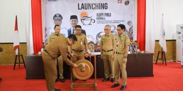 Pj Wali Kota Kotamobagu Abdullah Mokoginta Launching KOPI PAGI BUMDes