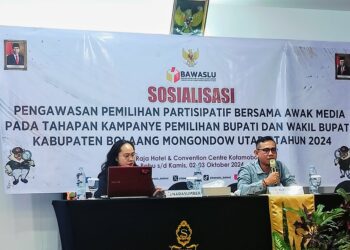 Foto : Sambutan Plt. Ketua Bawaslu Bolmut, Rizky Posangi, SH, pada kegiatan Sosialisasi Pemilih Partisipatif