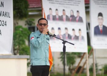 Plt Ketua Bawaslu Bolmut, Rizky Posangi Saat menyampaikan sambutan dalam Apel Siaga