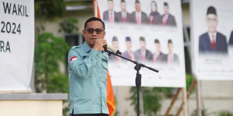 Plt Ketua Bawaslu Bolmut, Rizky Posangi Saat menyampaikan sambutan dalam Apel Siaga