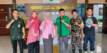 Foto : Ketua GP Ansor Bolmut beserta rombongan bersama Ketua PA Boroko