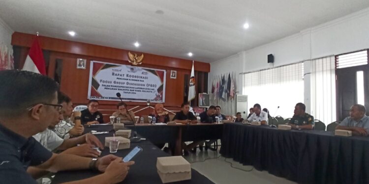 Penyusunan Laporan Evaluasi Pelaksanaan Pilkada, KPUD Kotamobagu Gelar FGD Bersama Unsur Terkait