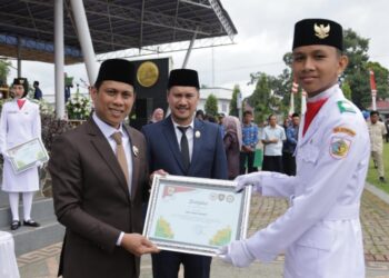 Momentum Hari Lahir Pancasila, Weny Gaib Kukuhkan Purna Paskibraka dan Duta Pancasila Kotamobagu Tahun 2025