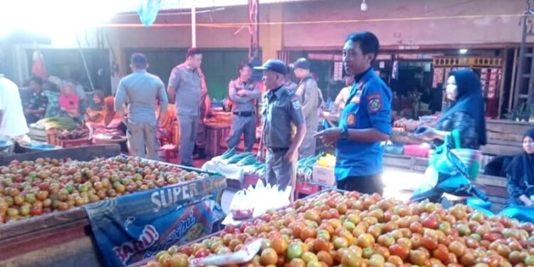 Jaga Kelancaran Aktivitas Pasar 23 Maret, Satpol PP Kotamobagu Gencarkan Patroli Rutin