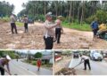 Dipimpin Kasat, Personil Satlantas Polres Kotamobagu Pulihkan Akses Jalan Akibat Banjir