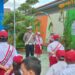 Polisi Sahabat Anak, Sat Lantas Polres Kotamobagu Tanamkan Semangat Nasionalisme Sejak Dini