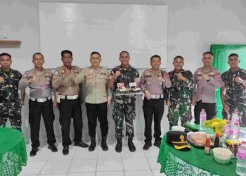 TNI–Polri Kompak! Polres Kotamobagu Turut Rayakan HUT TNI ke-80 di Kipan C Yonif 713/Satya Tama